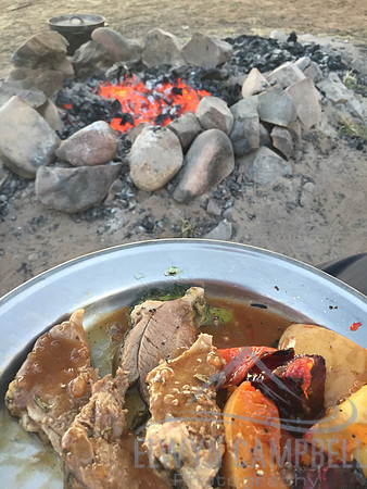 Roast lamb by the fire